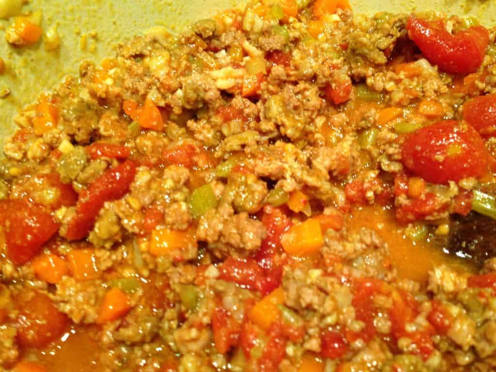 Bolognese sauce reduced and ready for serving over gluten-free pasta