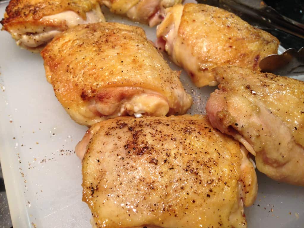 Browned chicken thighs.