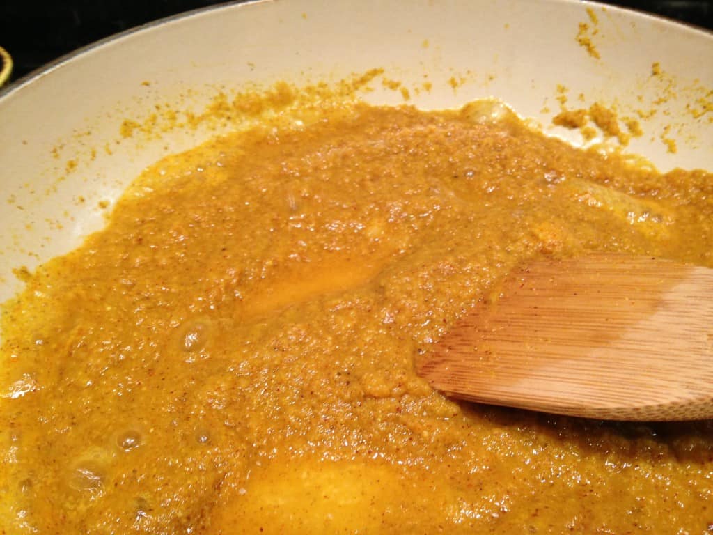 Browning the curry paste.