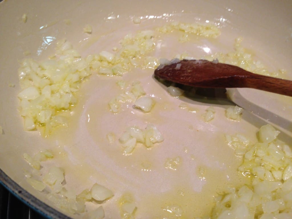 Onions sauteeing in olive oil.