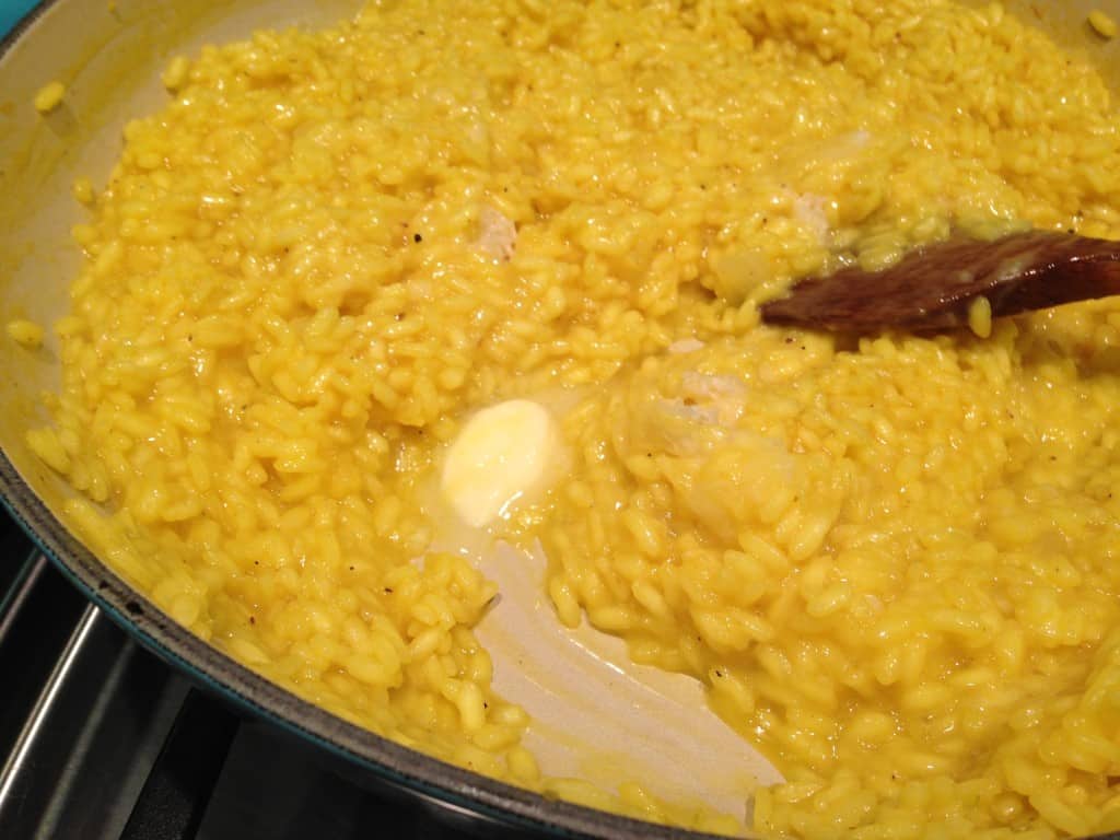 Butter added to Risotto Milanese.