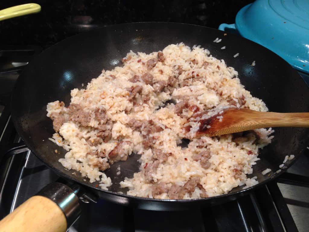 adding the gluten-free vinegar, garlic, and pepper sauce