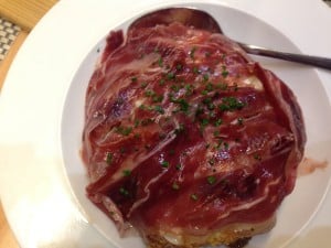 Ham, potatoes, and fried egg tapas at Teleferic in Barcelona